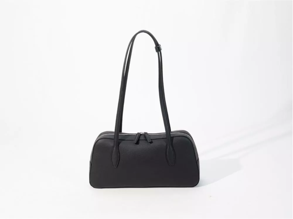 Bagaimana Cara Memilih Tas Ketiak Commuter? Panduan Perbandingan Komprehensif: Bahan PVC vs. PU